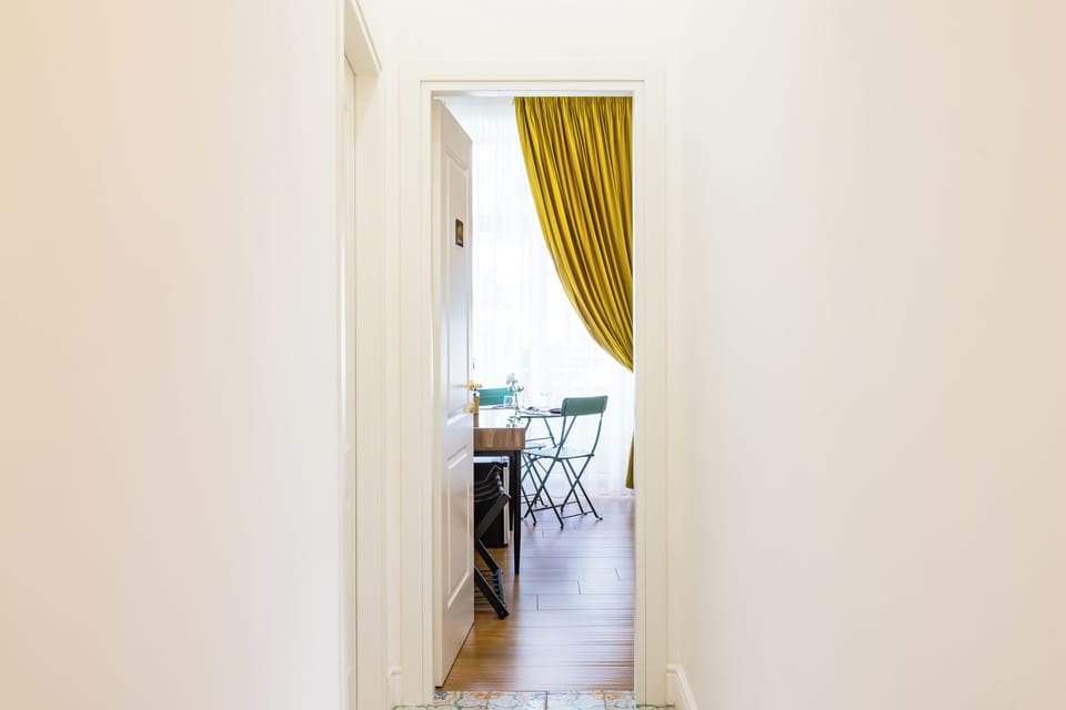 Deluxe Room, 1 King Bed, Balcony, City View | In-room safe, desk, laptop workspace, blackout drapes