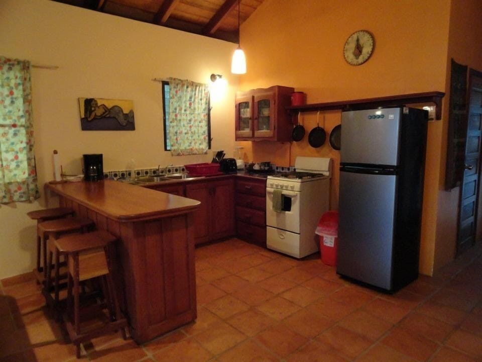 Cottage, Patio, Ocean View | Private kitchen | Coffee/tea maker, full-size fridge, microwave, oven