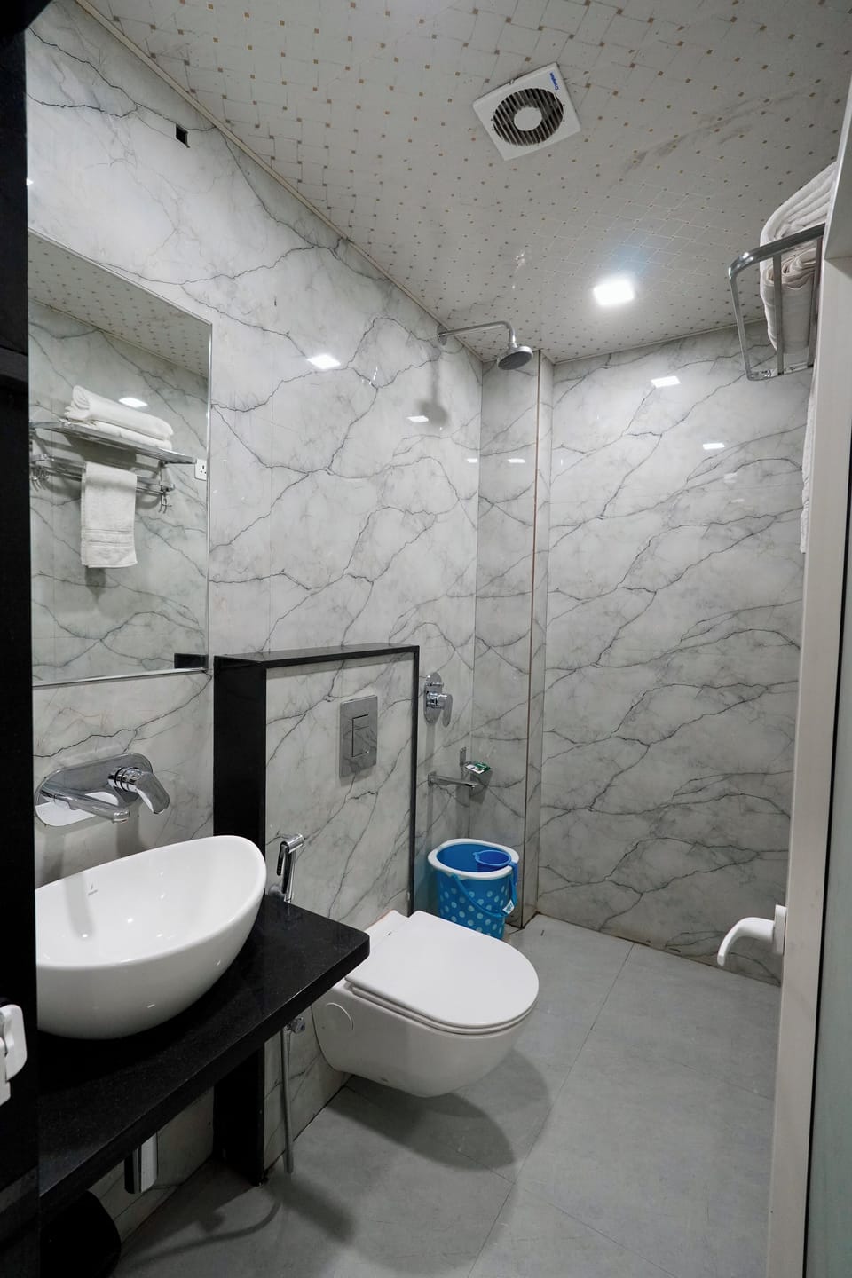 Shower, slippers, towels, soap
