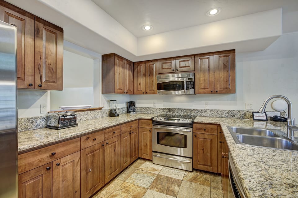 Condo, 2 Bedrooms | Private kitchen | Coffee/tea maker, fridge, oven, toaster