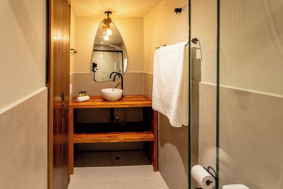 Triple Room | Bathroom | Shower, hair dryer, towels, soap