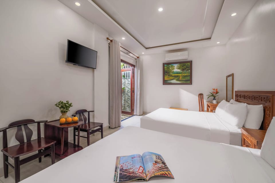 Family Quadruple Room, Garden View | Blackout drapes, free WiFi, wheelchair access