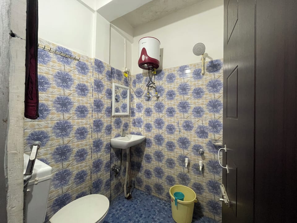 Shower, towels, soap, toilet paper