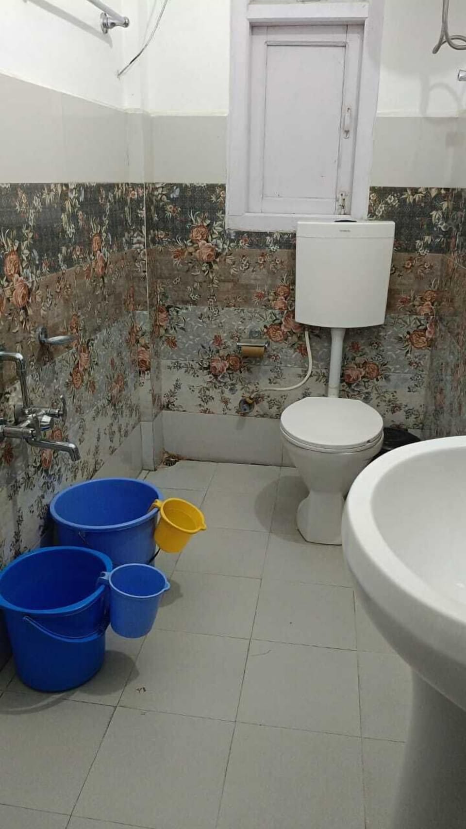 Shower, towels, soap, toilet paper
