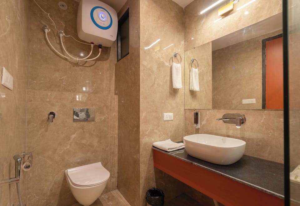 Shower, bathrobes, slippers, towels