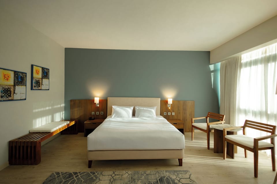 Deluxe King Bed City View | In-room safe, individually decorated, individually furnished, desk