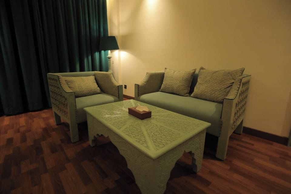Suite Room | Living area | 52-inch Smart TV with digital channels