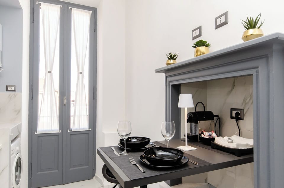 Apartment, Courtyard View | Private kitchen | Espresso maker, coffee/tea maker, full-size fridge, microwave