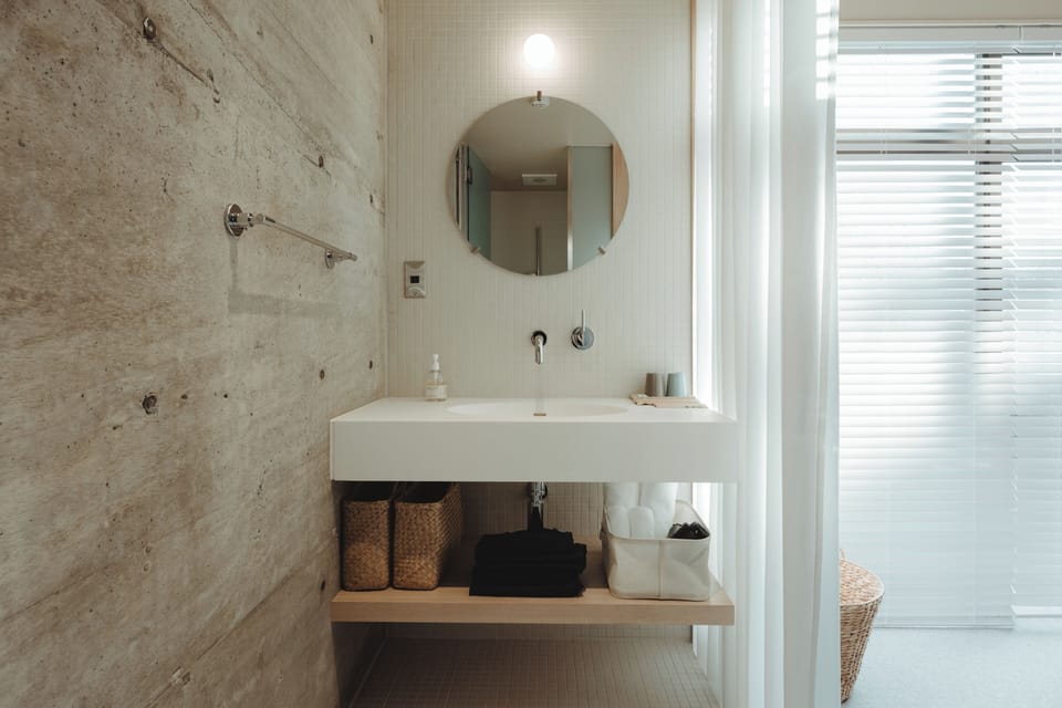 Standard Double Room | Bathroom | Rainfall showerhead, designer toiletries, hair dryer, slippers