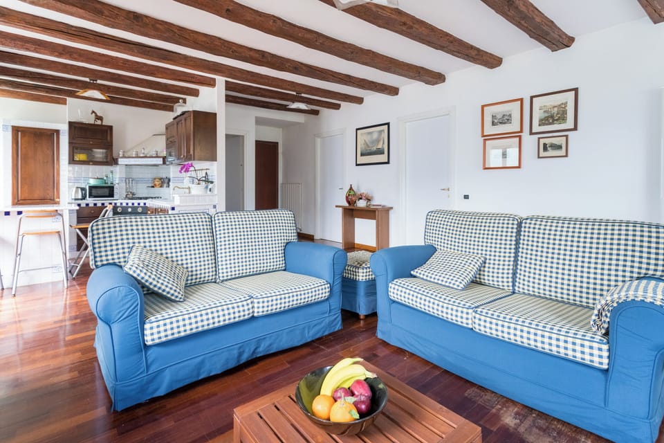 Apartment (2 Bedrooms) | Living area | 32-inch flat-screen TV with cable channels
