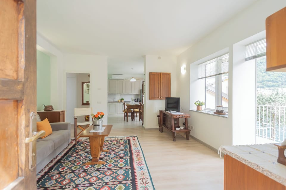 Apartment (2 Bedrooms) | Living area | 32-inch flat-screen TV with cable channels
