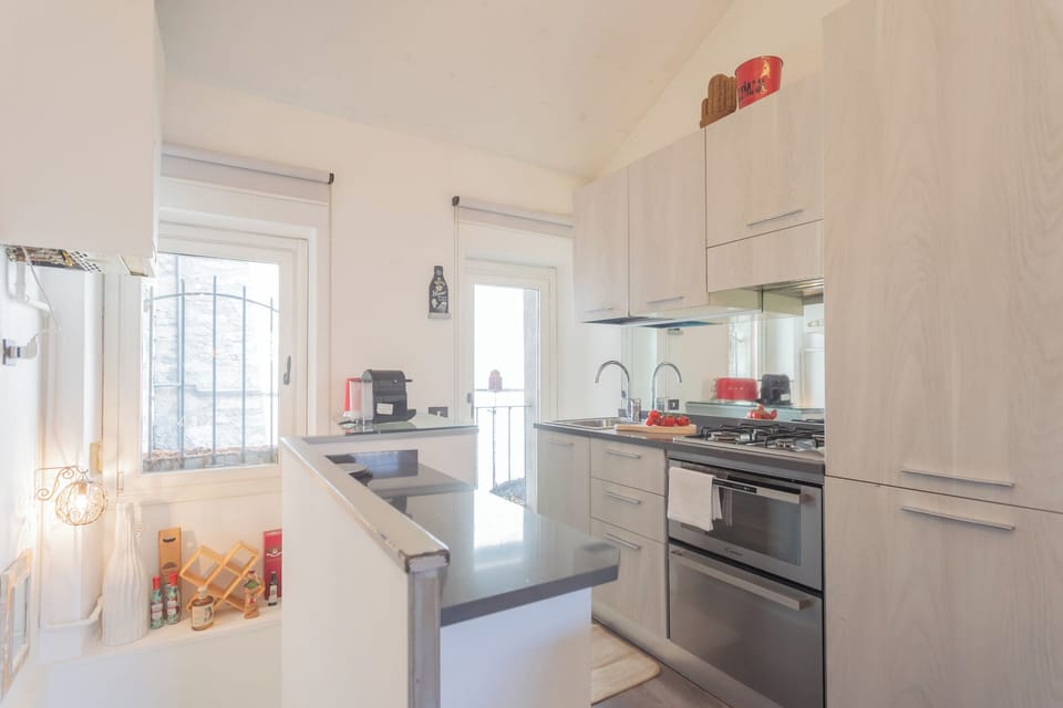 Apartment (1 Bedroom) | Private kitchenette | Oven, espresso maker, electric kettle, highchair