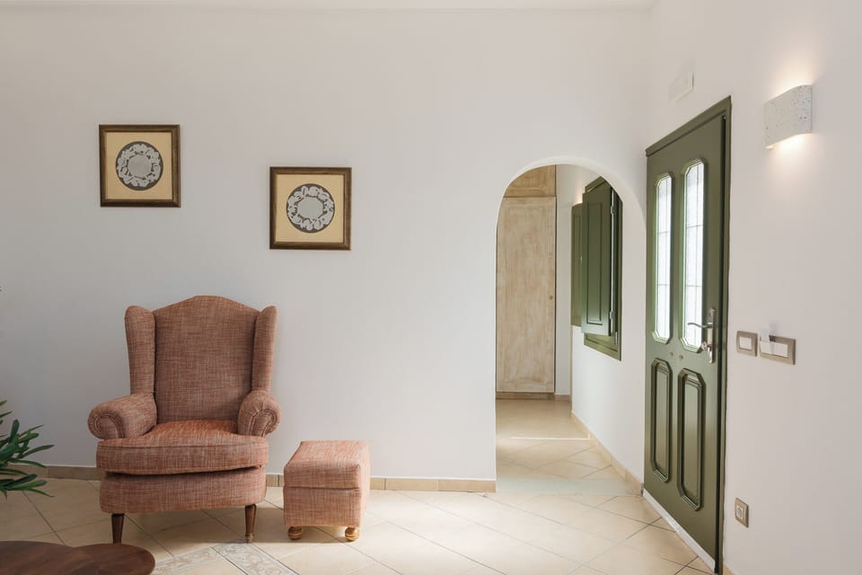 Ocean Caldera View Villa By Dalmyra Estate | Living area | Flat-screen TV