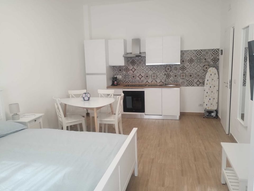 Apartment, 2 Bedrooms, Non Smoking, Balcony | Private kitchen | Espresso maker, coffee/tea maker, electric kettle, dining tables