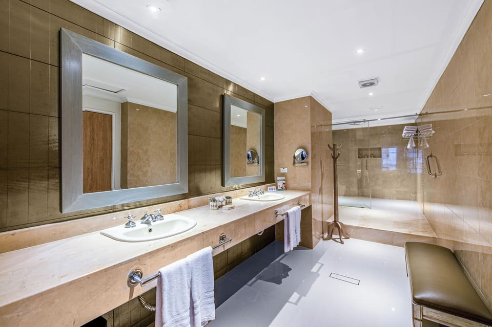 Presidential Suite, 2 Bedrooms | Minibar, in-room safe, desk, blackout drapes
