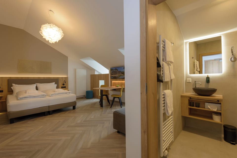 Family Room | Premium bedding, in-room safe, laptop workspace, blackout drapes