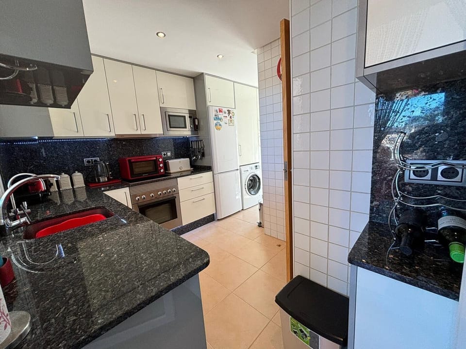 Villa | Private kitchen | Fridge, microwave, oven, stovetop