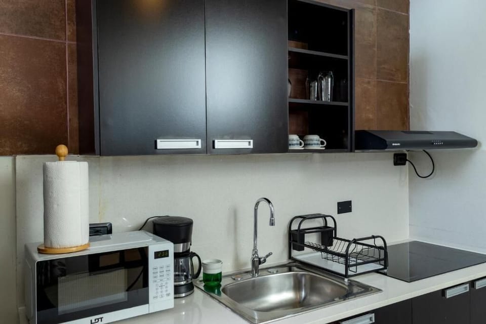 Triple Room, 1 King Bed with Sofa bed, Garden View | Private kitchen