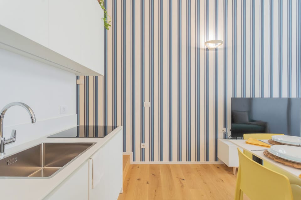 Apartment (1 Bedroom) | Private kitchenette | Microwave, espresso maker, electric kettle, highchair