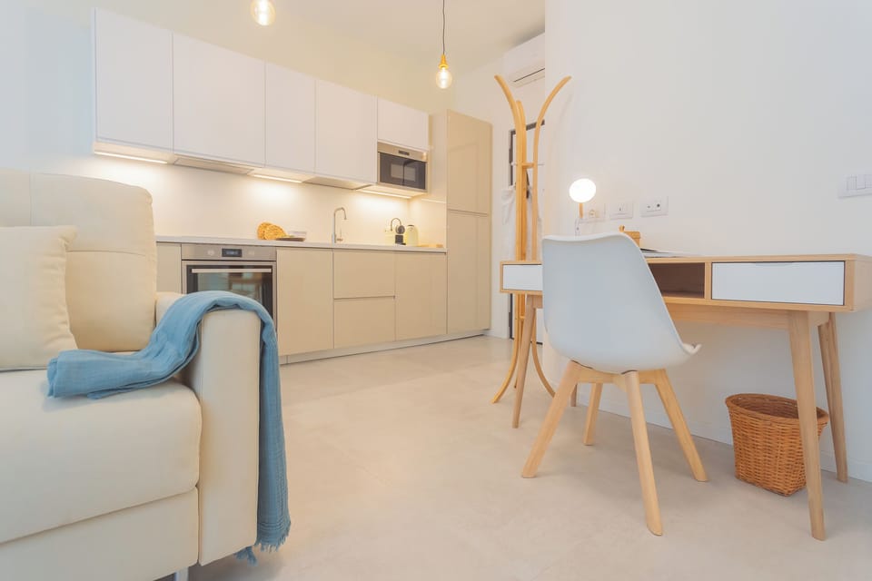 Apartment (1 Bedroom) | Living area | 32-inch flat-screen TV with cable channels