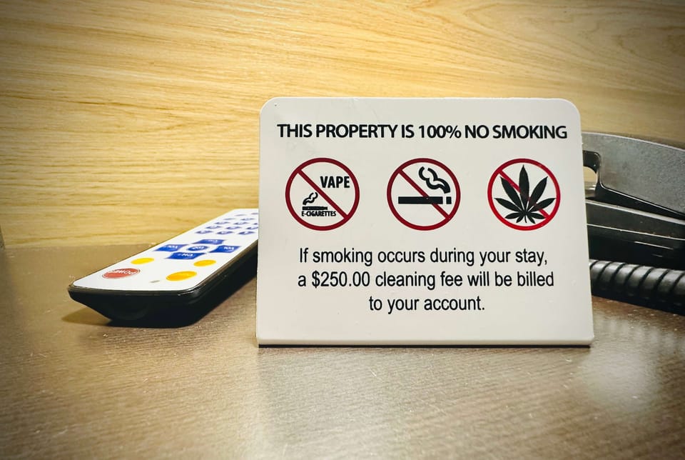 Desk, laptop workspace, blackout drapes, iron/ironing board