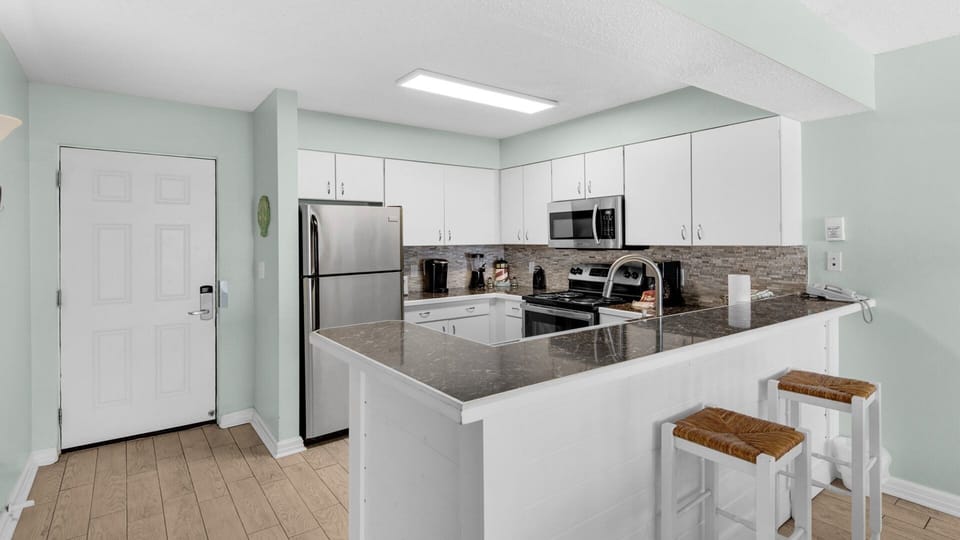 Condo, 2 Bedrooms | Private kitchen | Coffee/tea maker, fridge, oven, toaster