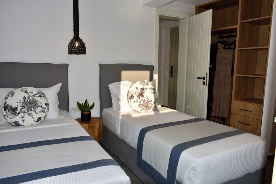 Family Villa, Private Pool, Sea View | Minibar, in-room safe, soundproofing, iron/ironing board