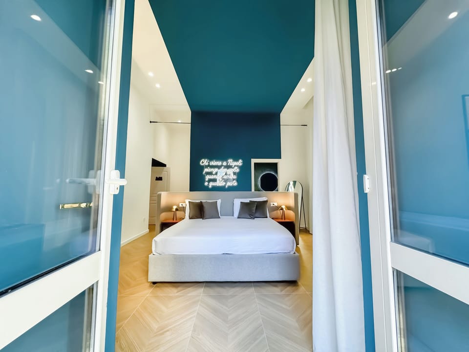 Deluxe Room, Balcony, City View | In-room safe, desk, blackout drapes, soundproofing
