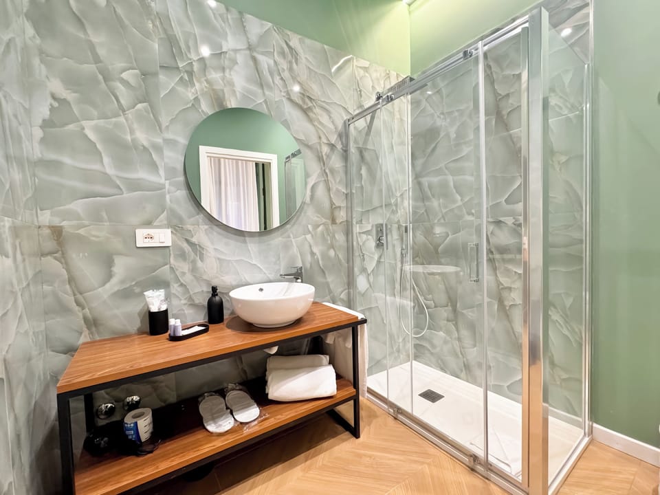 Superior Room, Balcony, City View | Bathroom | Shower, free toiletries, hair dryer, bathrobes