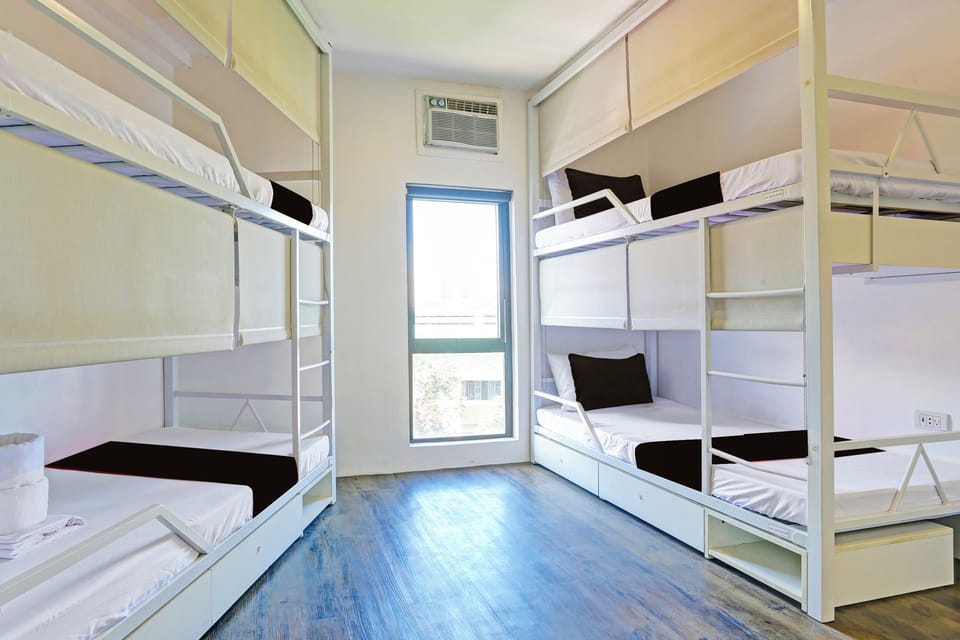 Premium bedding, desk, laptop workspace, free WiFi