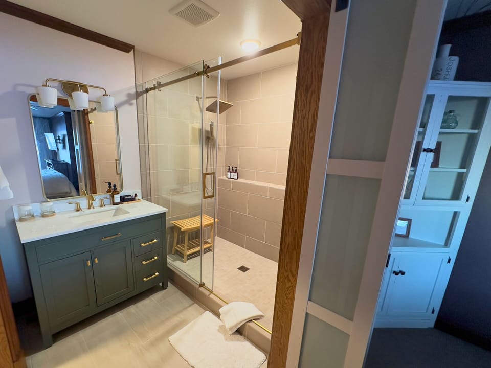 Sanctuary | Bathroom | Hair dryer, towels, soap, shampoo