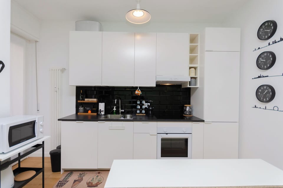 Apartment, Balcony, City View | Private kitchen | Full-size fridge, microwave, oven, stovetop