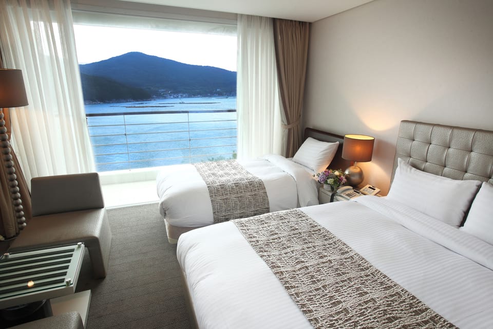 Deluxe Twin Room, Non Smoking, Ocean View | Blackout drapes, iron/ironing board, free WiFi, bed sheets