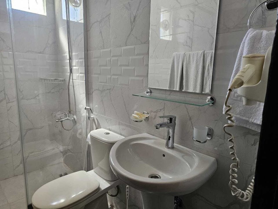 Hair dryer, bathrobes, slippers, bidet