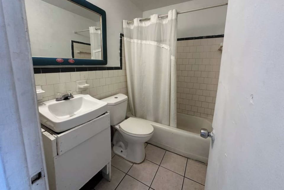Shower, free toiletries, towels, toilet paper