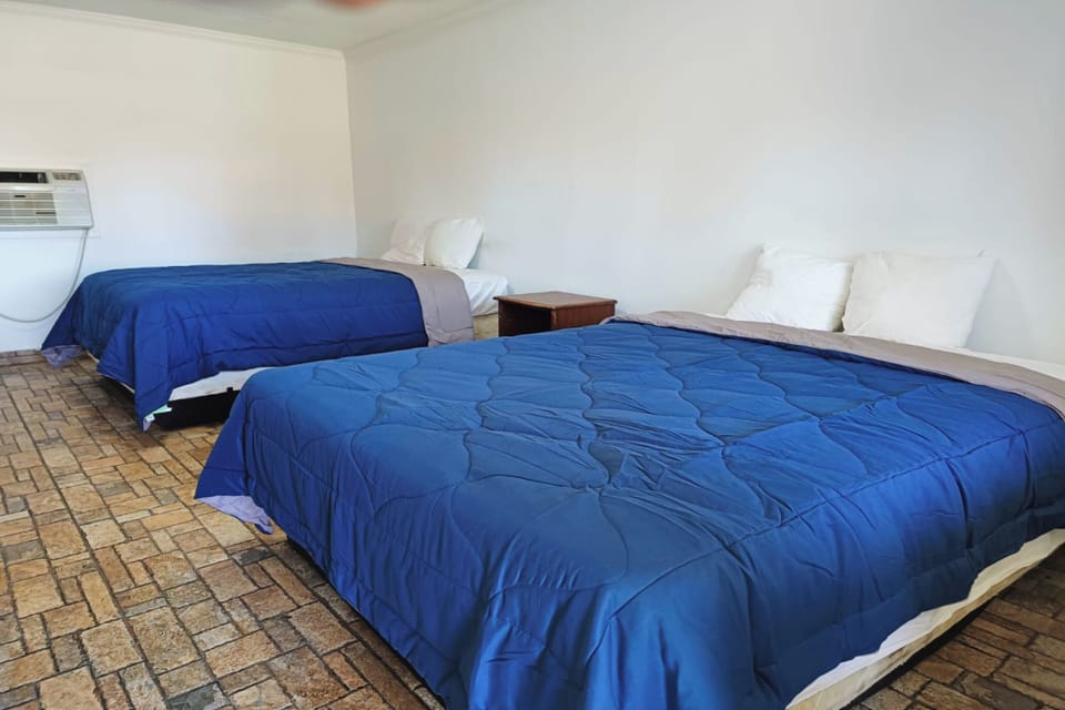 Room, 2 Queen Beds | Desk, free rollaway beds, free WiFi, bed sheets