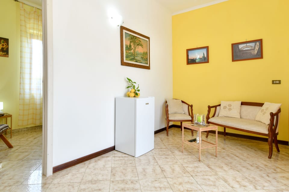 Family Apartment, 1 Bedroom, Private Bathroom, Ground Floor | Living room | Flat-screen TV
