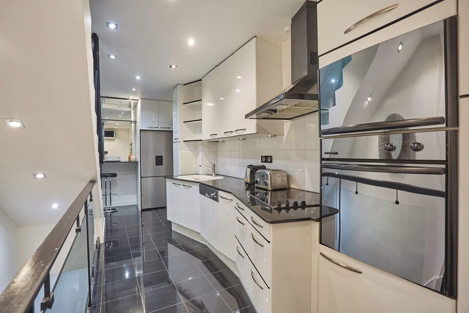 Apartment | Private kitchen | Cleaning supplies
