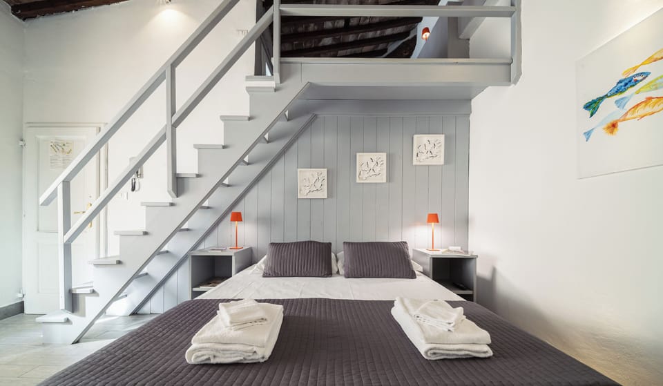 Quadruple Room | Blackout drapes, iron/ironing board, free WiFi