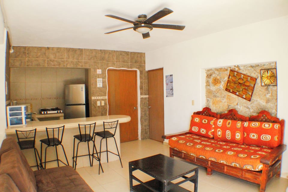 Comfort Apartment, Pool View | Living area