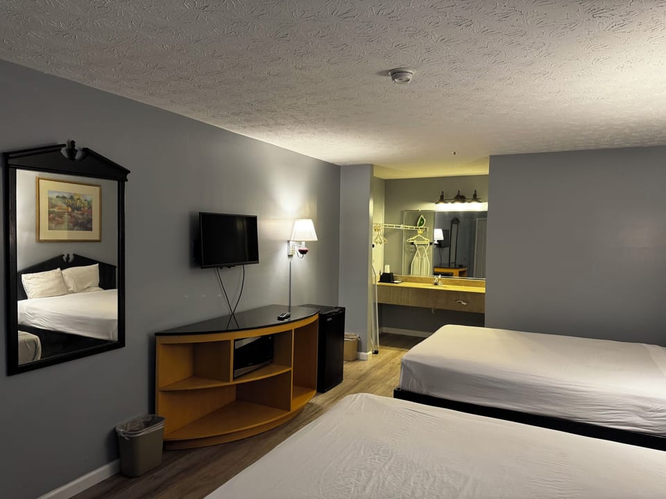 Desk, blackout drapes, iron/ironing board, free WiFi