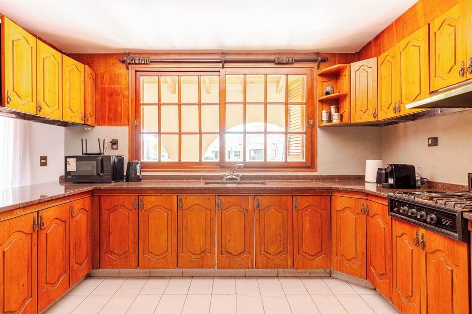Villa | Private kitchen | Full-size fridge, microwave, oven, stovetop