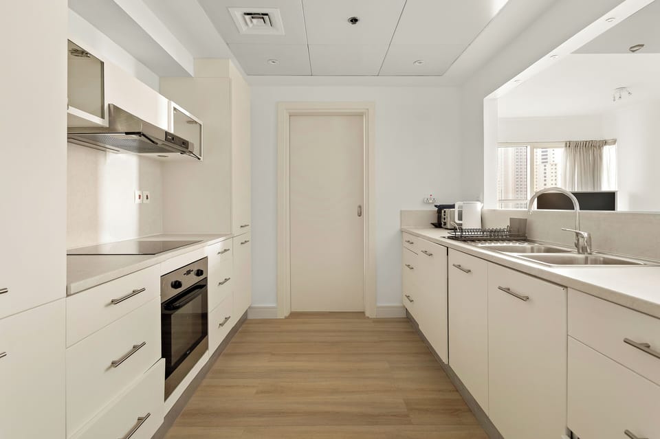 Exclusive Apartment, 1 King Bed | Private kitchen | Coffee/tea maker, full-size fridge, electric kettle, toaster