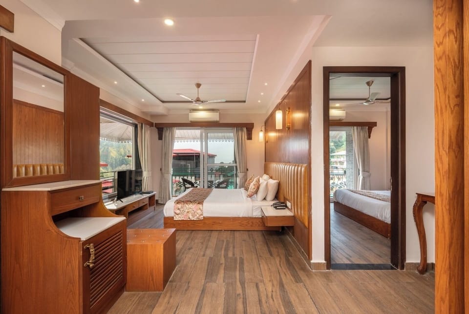 Family Quadruple Room, Balcony, Mountain View | Premium bedding, in-room safe, desk, iron/ironing board