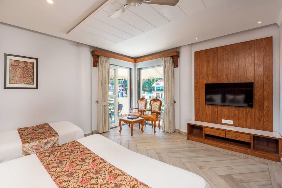 Luxury Triple Room, Balcony, Mountain View | Premium bedding, in-room safe, desk, iron/ironing board