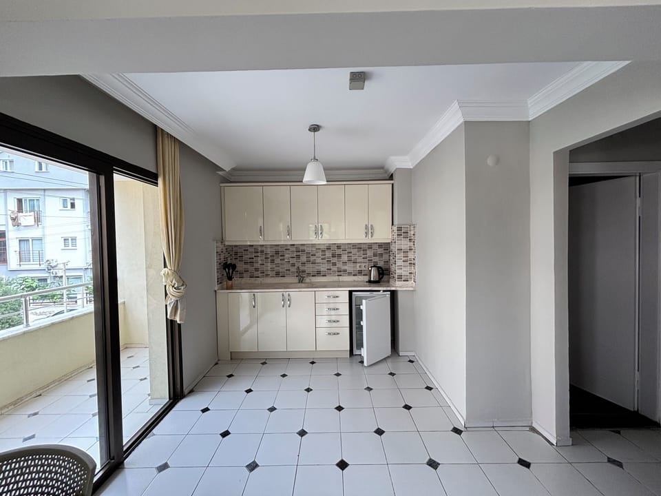 Family Apartment, 1 Bedroom, Balcony, City View | 1 bedroom, desk, laptop workspace, soundproofing