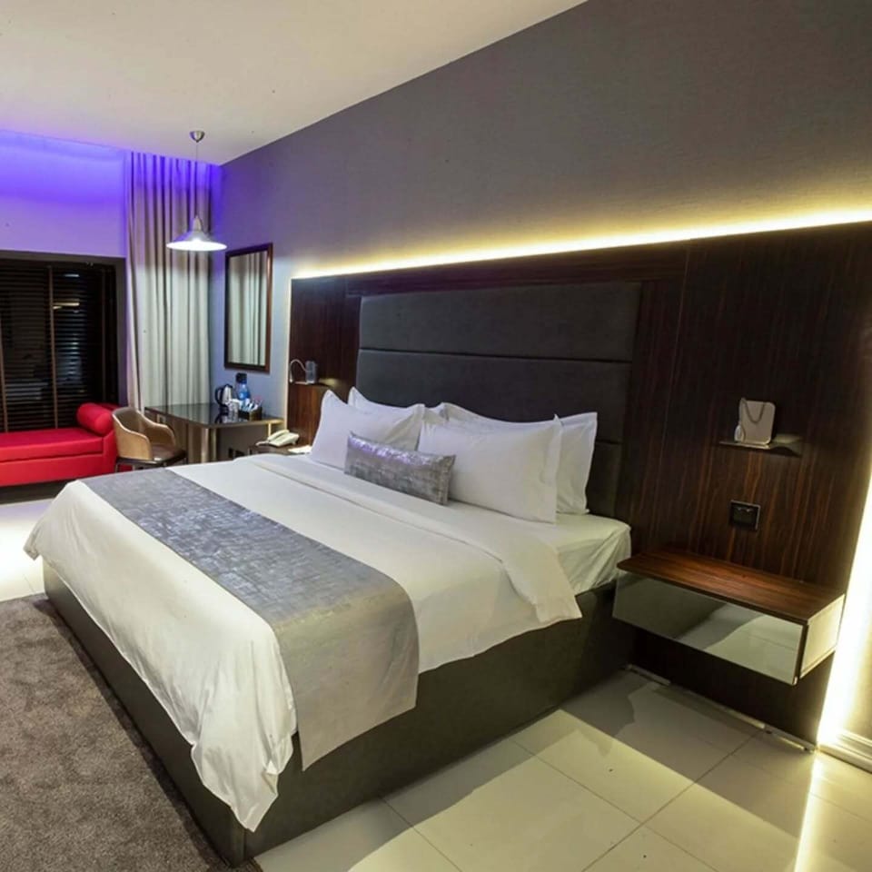 Economy Room, Balcony, City View | Desk, laptop workspace, blackout drapes, soundproofing