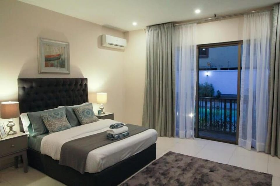 Family Apartment, Balcony, City View | 2 bedrooms, desk, laptop workspace, blackout drapes