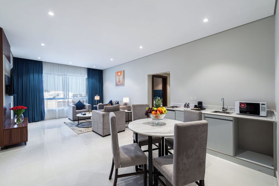 Family Suite, 2 Bedrooms, Non Smoking | Living area | 55-inch flat-screen TV with digital channels