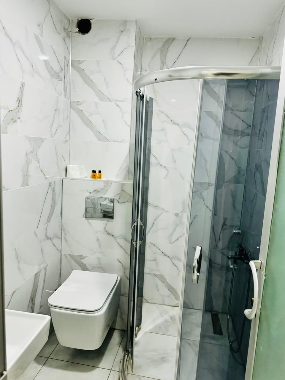 Hair dryer, bathrobes, slippers, towels